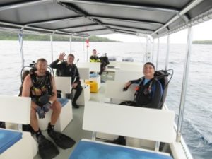 bent prop crew gearing up for scuba dive in palau