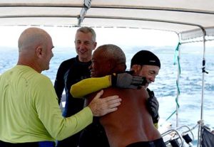 celebrating on board dive boat after finding lost wwii aircraft