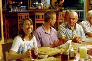 smiling at dinner in palau after finding a lost wwii aircraft