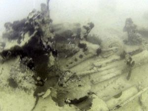 F6F 3 Hellcat found in Palau Underwater image of Lt. Punnell's hellcat tail wheel found in palau by bentprop.org