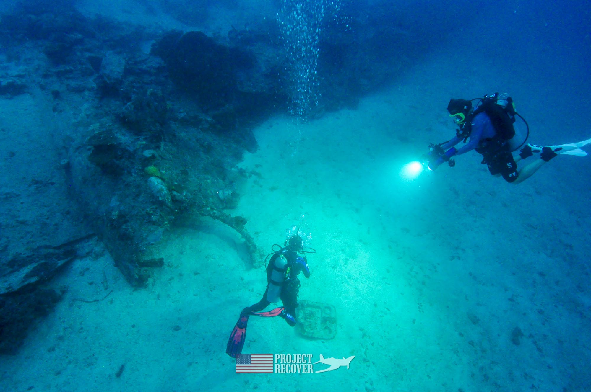 Harry Parker films teammate Megan Lickliter-Mundon while Scuba diving MIA crash sites - Project Recover and BentProp Project are committed to bringing the MIA home. Photos by Harry Parker Photography.com