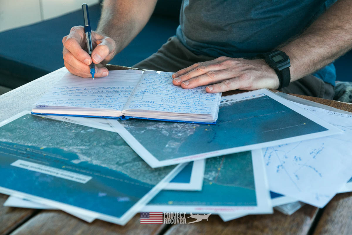 Ewan Stevenson making notes and studying maps on the hunt for a downed MIA WWII aircraft during Solomons MIA Search - Project Recover and BentProp Project are committed to bringing the MIA home. Photos by Harry Parker Photography.com