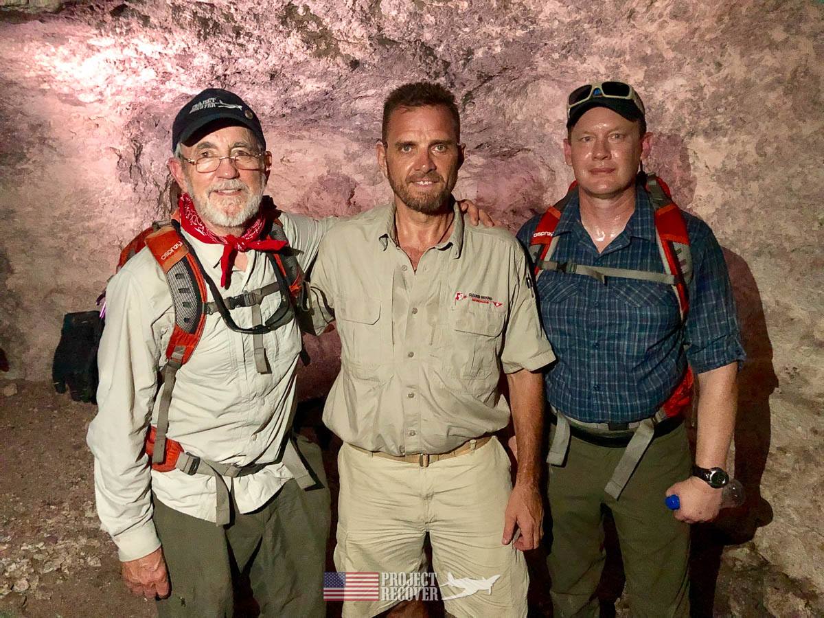 Pat Scannon (Project Recover President), Steve Ballinger (Cleared Ground Demining director), and Dave Bavencoff(Project Recover volunteer) in the limestone cave; a Japanese hideout in WWII.