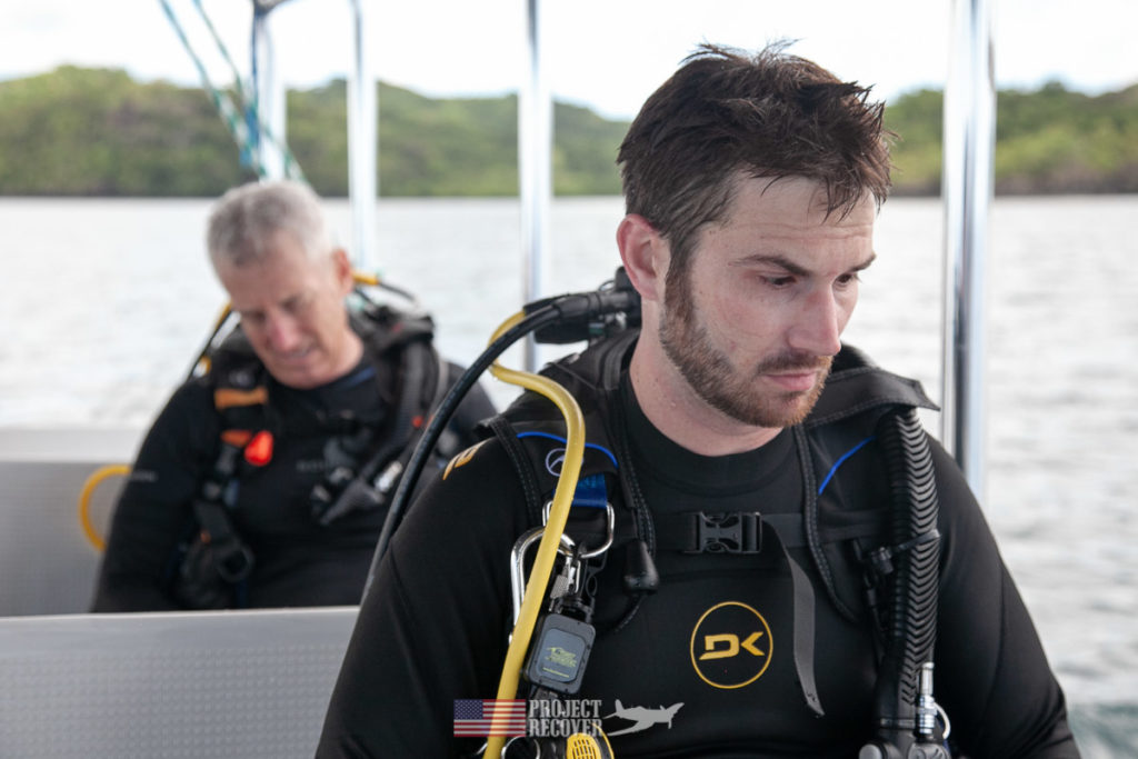 Adam Gray (MIA Family) contemplates dive to uncle's wreck in Palau. Photo by Harry Parker Photography.