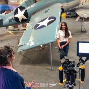 students aboard USS Midway being interviewed
