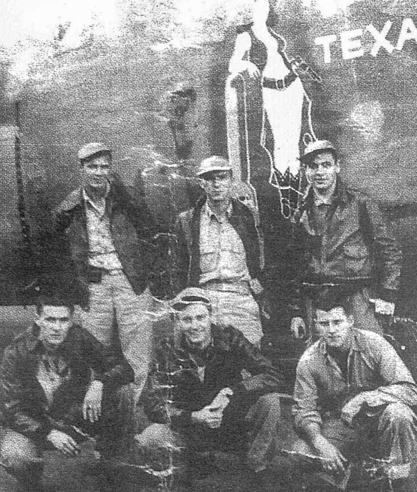 Capt. Pratte and his crew pose in front of the Belle of Texas, the aircraft he flew prior to the Song of Bernadette.