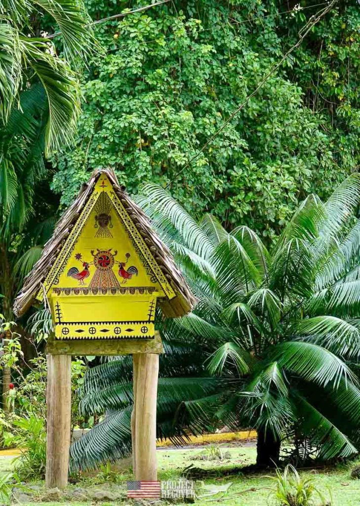 a replica of a Bai in the jungle of palau