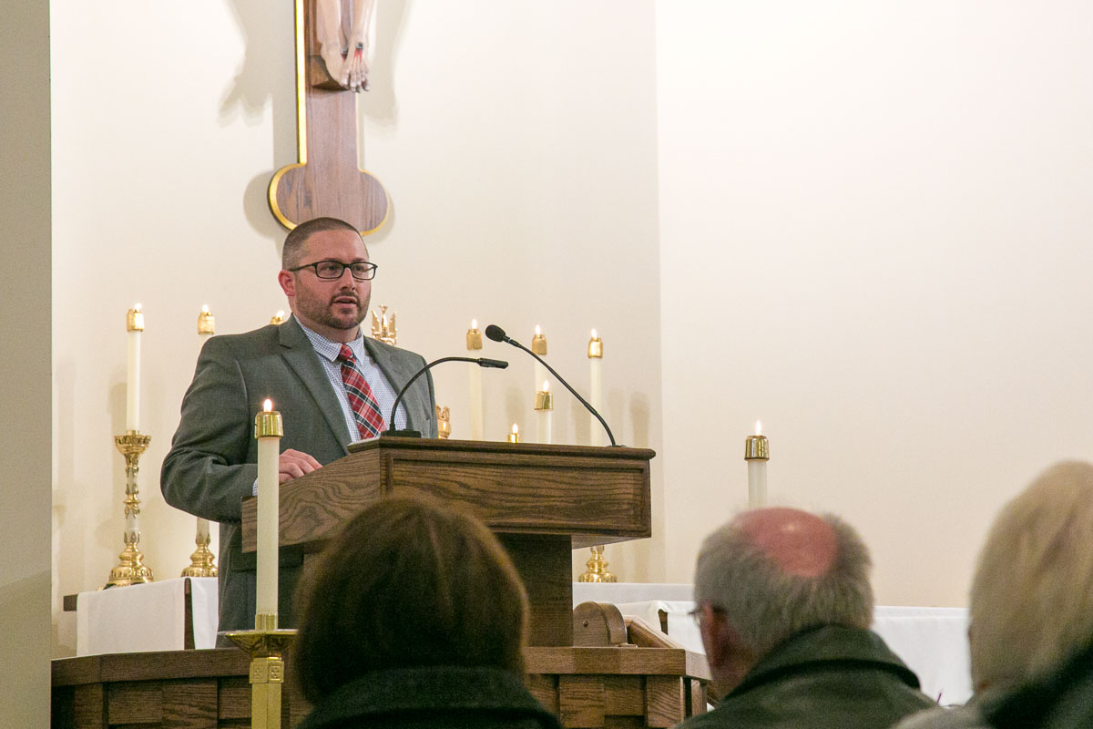 Jim Gray speaking in church at memorial